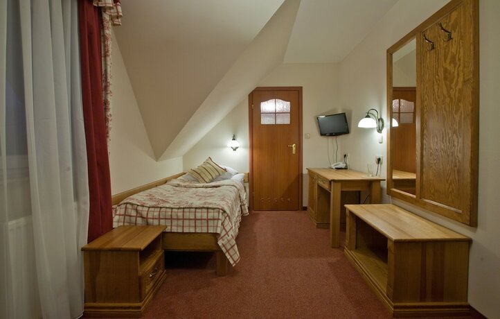 Imagen de la habitación del Hotel Helan Family and Garden. Foto 17