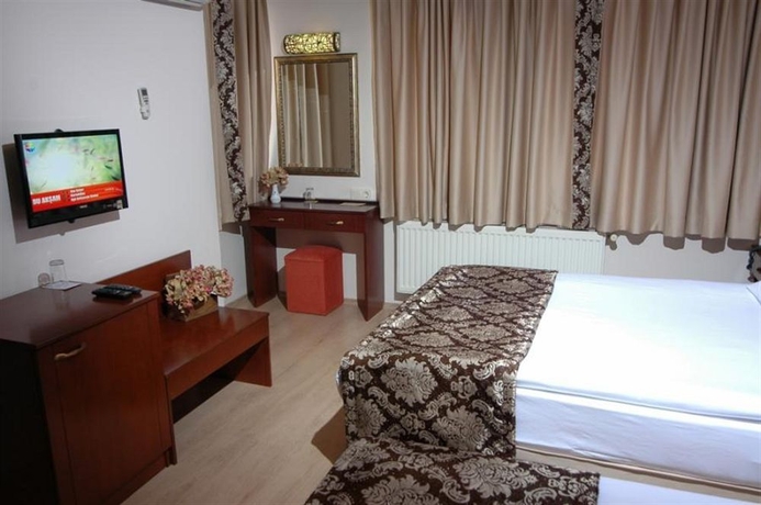 Imagen de la habitación del Hotel Helen, &Ccedil;anakkale. Foto 11