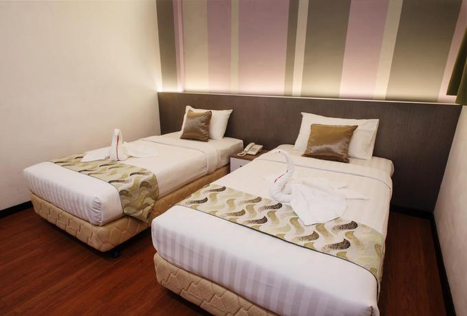 Imagen de la habitación del Hotel Heliconia. Foto 4