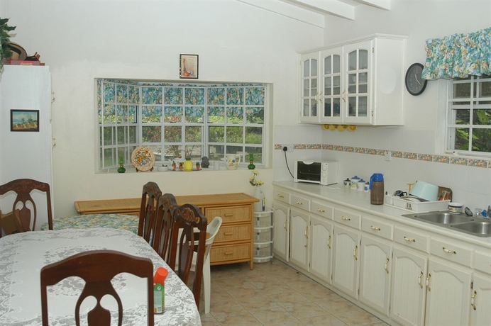 Imagen de la habitación del Hotel Heliconia House. Foto 2