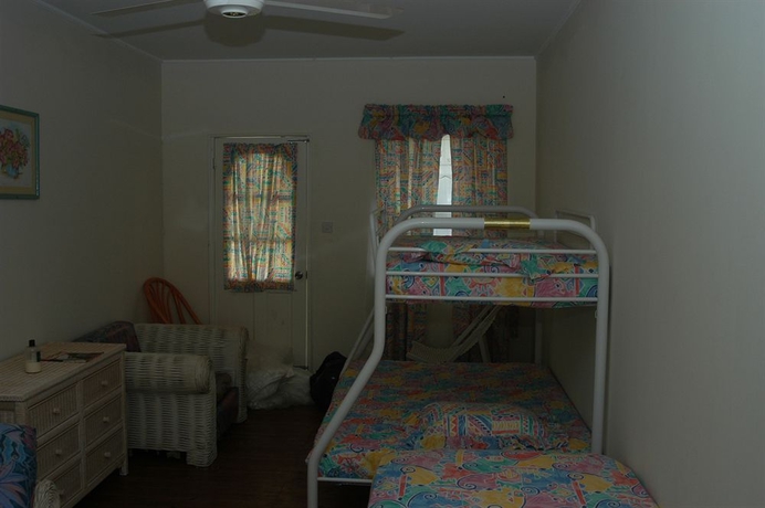 Imagen de la habitación del Hotel Heliconia House. Foto 5