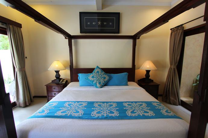 Imagen de la habitación del Hotel Heliconia Villa. Foto 8