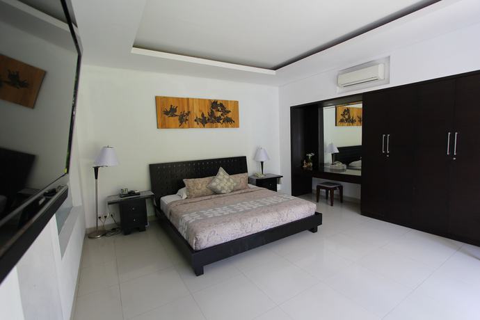 Imagen de la habitación del Hotel Heliconia Villa. Foto 11