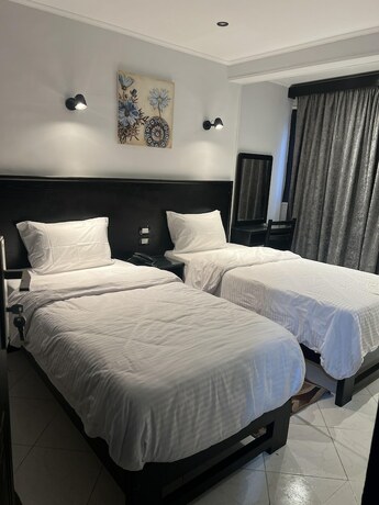 Imagen de la habitación del Hotel Helio Cairo. Foto 13