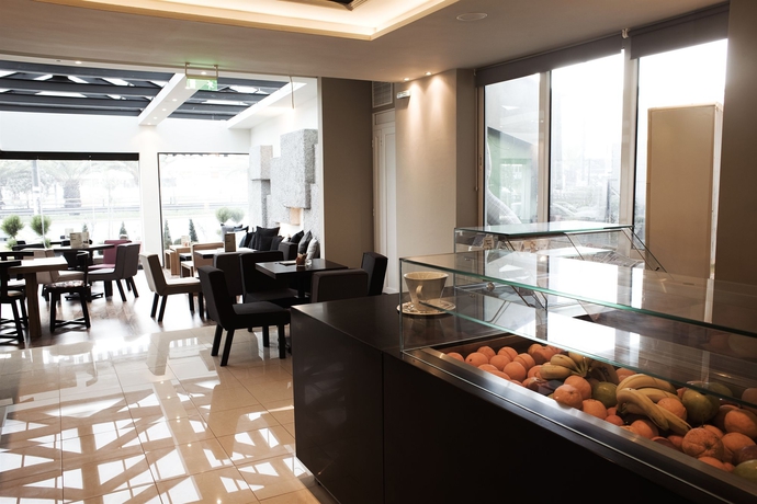 Imagen del bar/restaurante del Hotel Hellinis. Foto 8