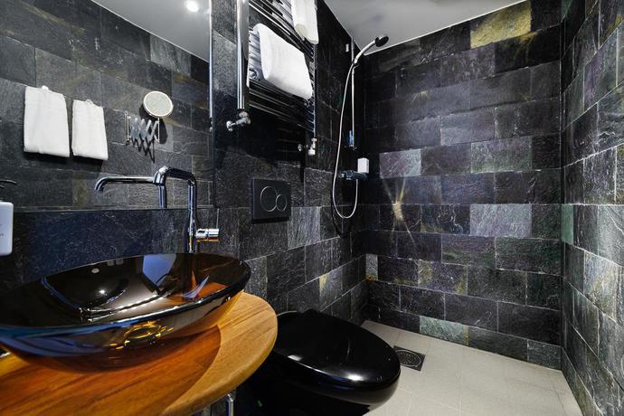 Imagen de la habitación del Hotel Hellstens Glashus. Foto 4