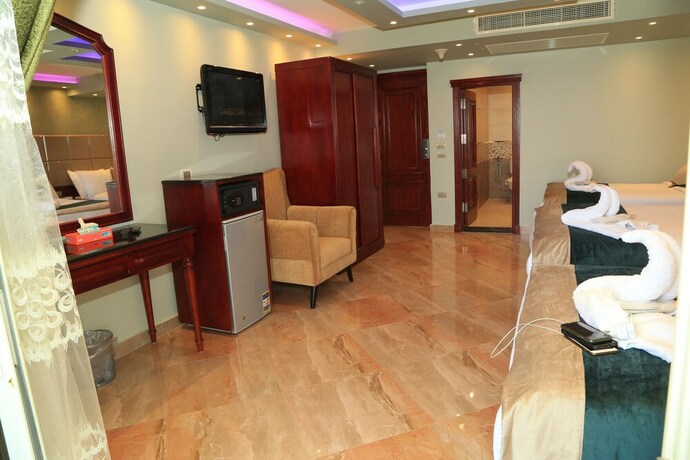 Imagen de la habitación del Hotel Helnan Nile Island. Foto 19