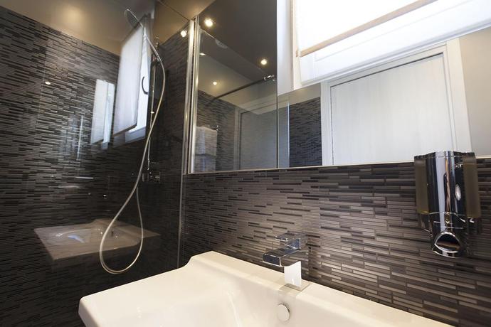 Imagen de la habitación del Hotel Helussi. Foto 6