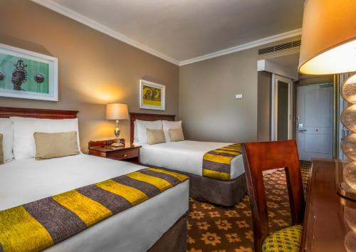 Imagen de la habitación del Hotel Hemingways. Foto 17