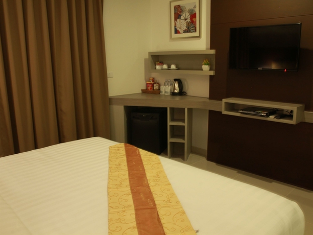 Imagen de la habitación del Hotel Hemingways Silk. Foto 5