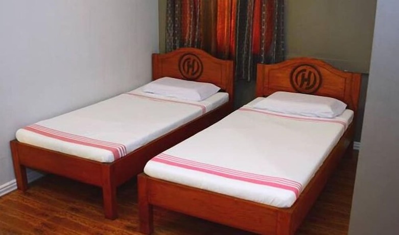 Imagen de la habitación del Hotel Henady Inn Annex. Foto 13