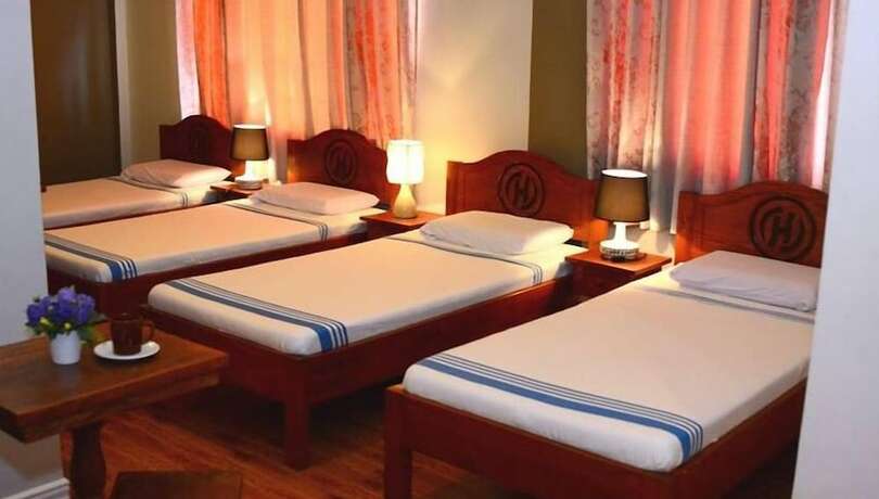 Imagen de la habitación del Hotel Henady Inn Annex. Foto 15