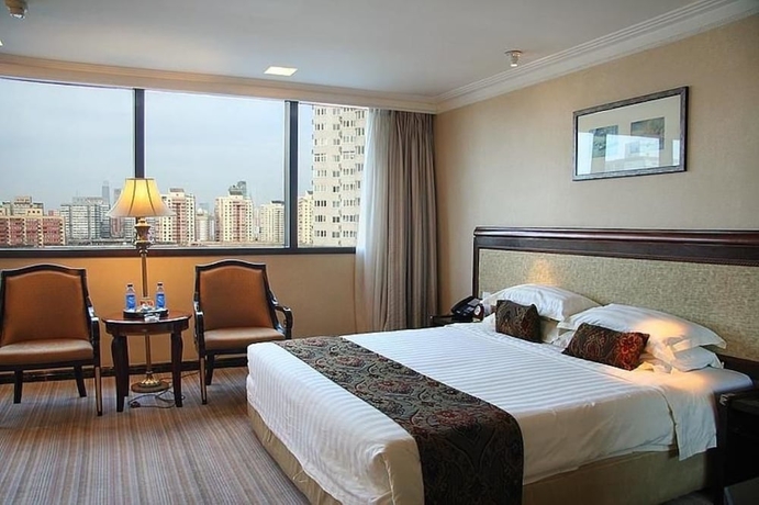 Imagen de la habitación del Hotel Henan Plaza - Beijing. Foto 5