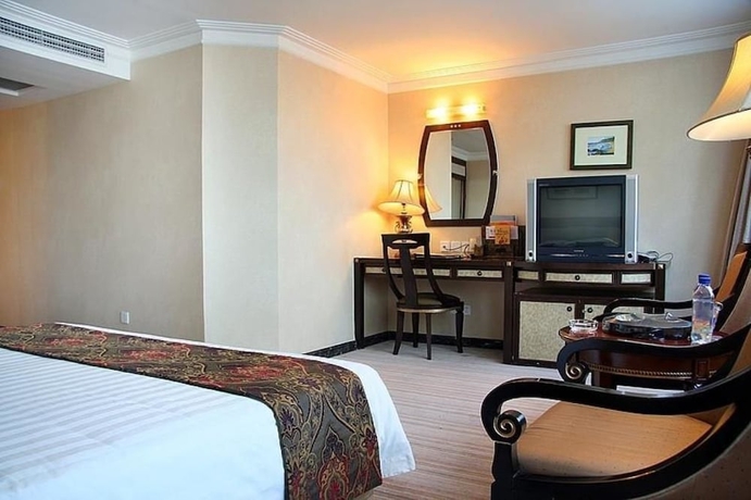Imagen de la habitación del Hotel Henan Plaza - Beijing. Foto 9