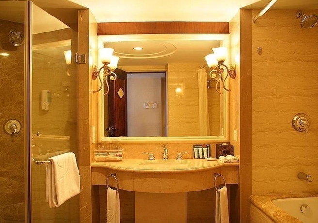 Imagen de la habitación del Hotel Henan Plaza - Beijing. Foto 12