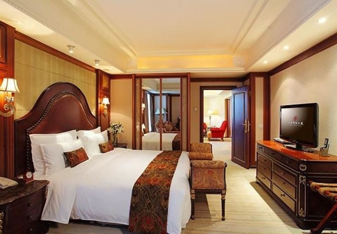 Imagen de la habitación del Hotel Henan Plaza - Beijing. Foto 13