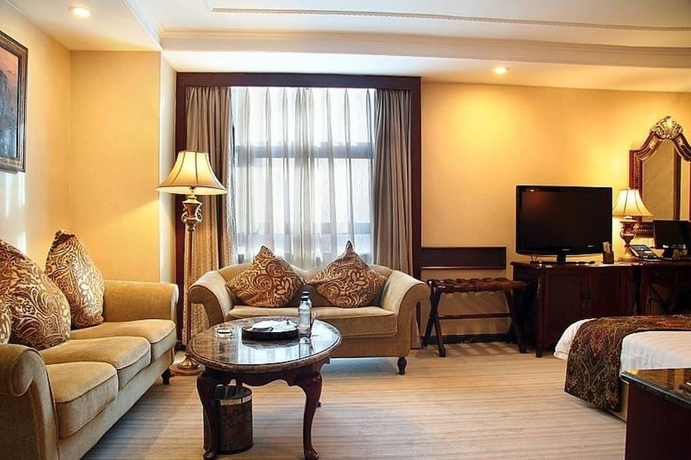 Imagen de la habitación del Hotel Henan Plaza - Beijing. Foto 14