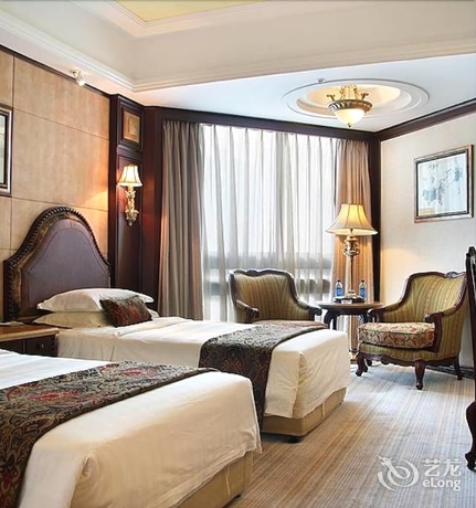 Imagen de la habitación del Hotel Henan Plaza - Beijing. Foto 18
