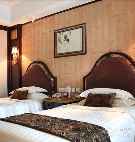 Imagen de la habitación del Hotel Henan Plaza - Beijing. Foto 19