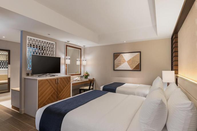 Imagen de la habitación del Hotel Henann Crystal Sands Resort. Foto 18