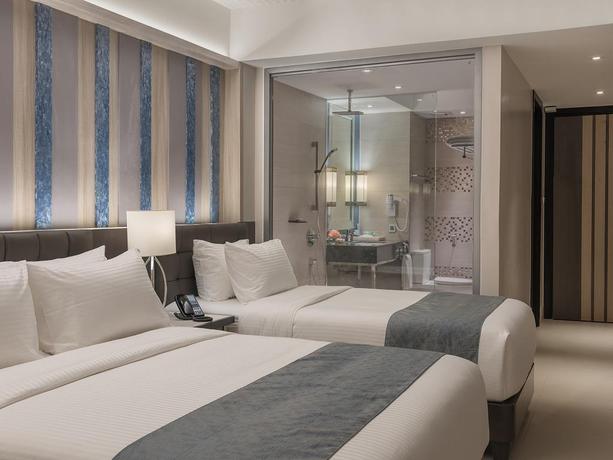 Imagen de la habitación del Hotel Henann Palm Beach Resort. Foto 10