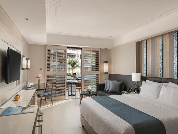 Imagen de la habitación del Hotel Henann Palm Beach Resort. Foto 11