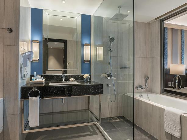 Imagen de la habitación del Hotel Henann Palm Beach Resort. Foto 13