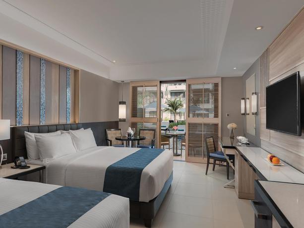 Imagen de la habitación del Hotel Henann Palm Beach Resort. Foto 14