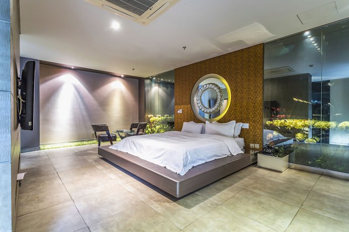 Imagen de la habitación del Hotel Hengbo. Foto 6