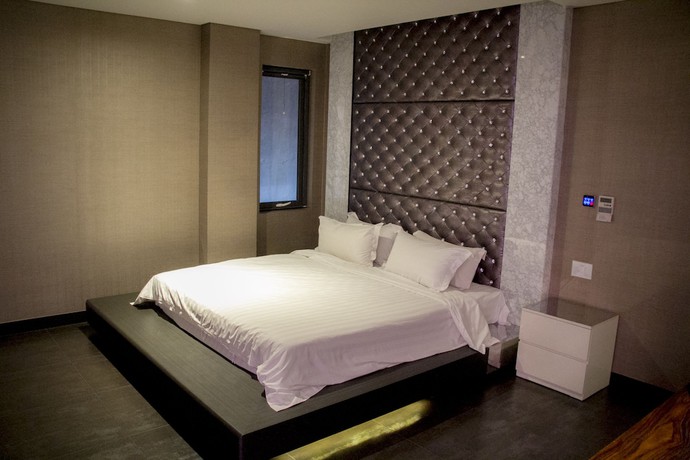 Imagen de la habitación del Hotel Hengbo. Foto 7