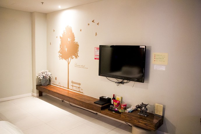 Imagen de la habitación del Hotel Hengbo. Foto 11