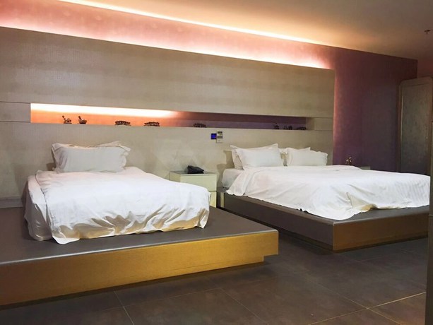 Imagen de la habitación del Hotel Hengbo. Foto 13