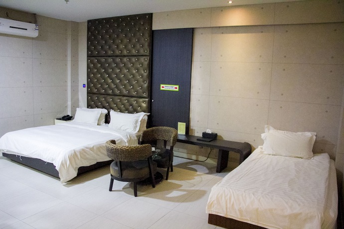 Imagen de la habitación del Hotel Hengbo. Foto 15