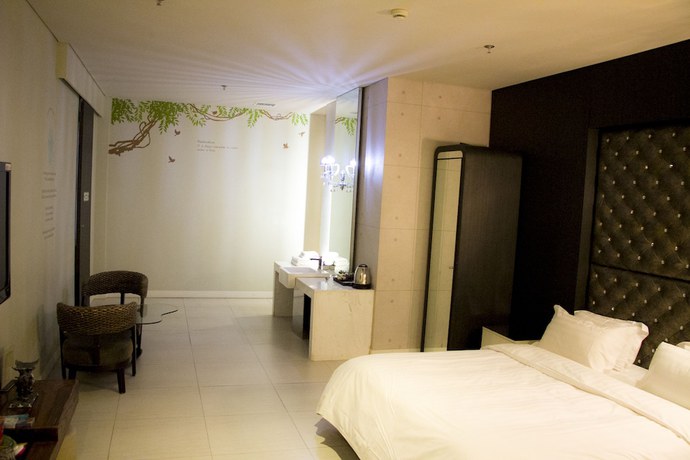 Imagen de la habitación del Hotel Hengbo. Foto 16