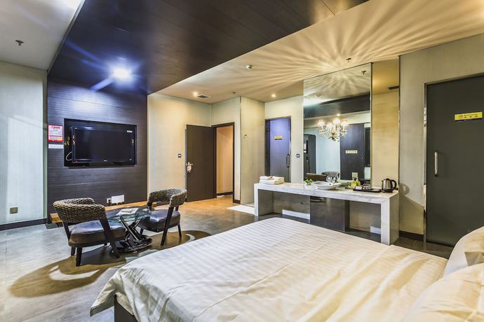 Imagen de la habitación del Hotel Hengbo. Foto 18