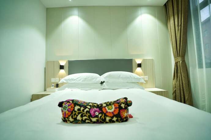 Imagen de la habitación del Hotel Hengdian Chayan Guest House. Foto 15