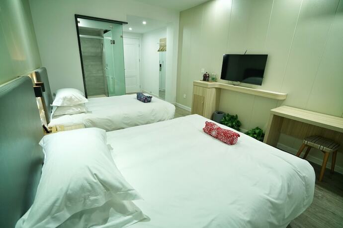 Imagen de la habitación del Hotel Hengdian Chayan Guest House. Foto 28