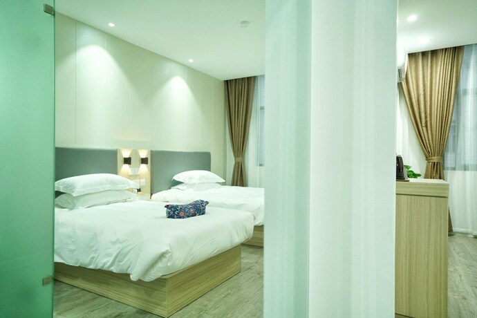 Imagen de la habitación del Hotel Hengdian Chayan Guest House. Foto 29
