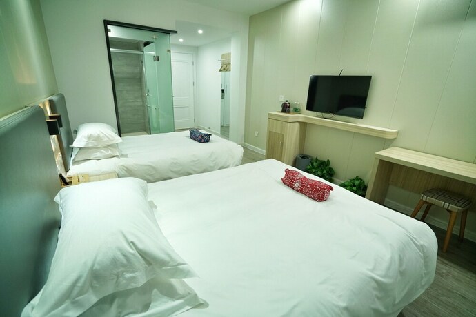 Imagen de la habitación del Hotel Hengdian Chayan Guest House. Foto 30
