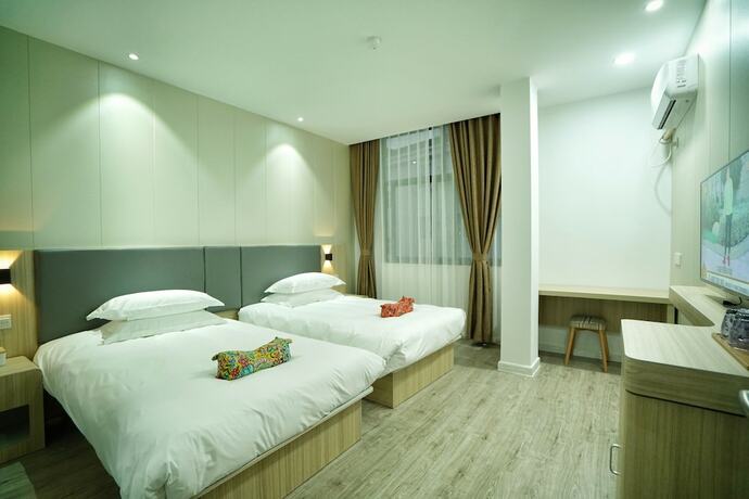 Imagen de la habitación del Hotel Hengdian Chayan Guest House. Foto 32