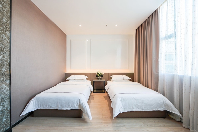 Imagen de la habitación del Hotel Hengdong Business - Guangzhou. Foto 4