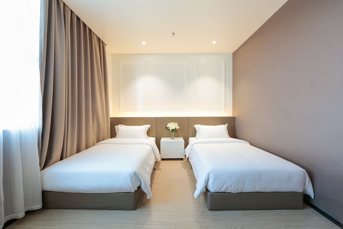 Imagen de la habitación del Hotel Hengdong Business - Guangzhou. Foto 11