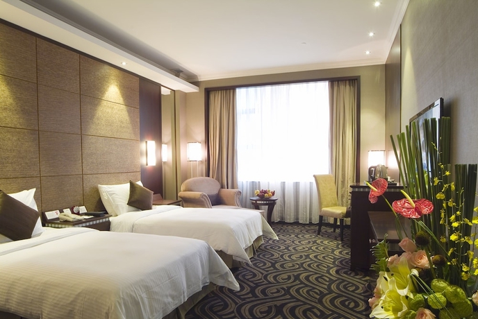 Imagen de la habitación del Hotel Hengfeng Haiyue International. Foto 8