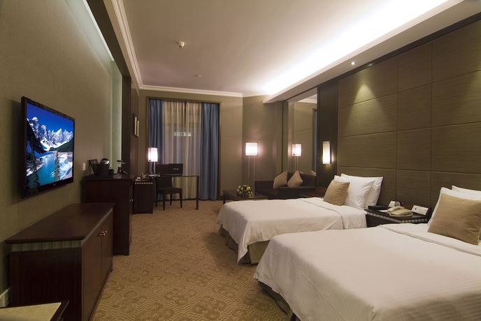 Imagen de la habitación del Hotel Hengfeng Haiyue International. Foto 9