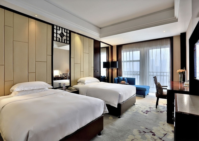 Imagen de la habitación del Hotel Hengna International. Foto 4