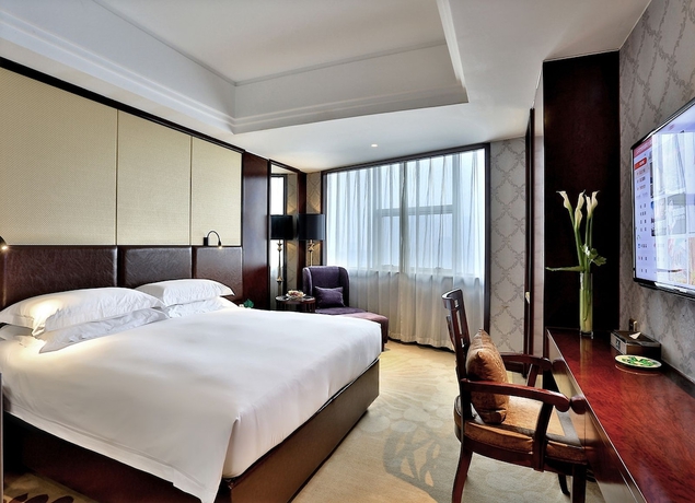 Imagen de la habitación del Hotel Hengna International. Foto 12