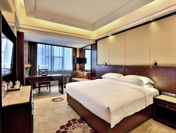 Imagen de la habitación del Hotel Hengna International. Foto 14