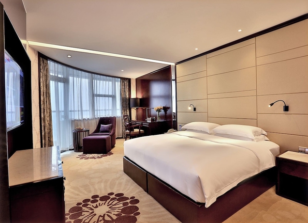 Imagen de la habitación del Hotel Hengna International. Foto 16