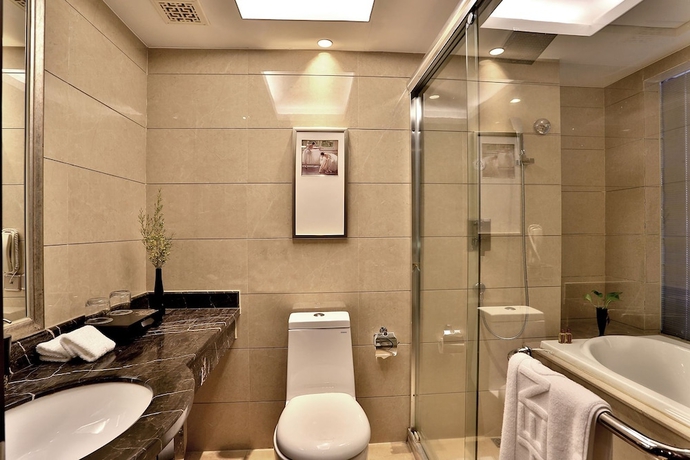 Imagen de la habitación del Hotel Hengna International. Foto 17
