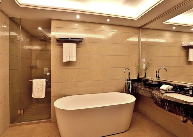 Imagen de la habitación del Hotel Hengna International. Foto 19